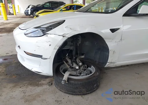 2023 Tesla Model 3 Rear-Wheel Drive from USA, damaged, VIN 5YJ3E1EA7PF409310